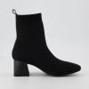 imageCUSHIONAIRE Womens Milo Stretch Ankle Sock Boot  Soft Knit Upper Memory Foam Padding Lightweight 175quot Heel Wide Widths AvailableBlack