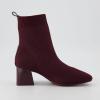 imageCUSHIONAIRE Womens Milo Stretch Ankle Sock Boot  Soft Knit Upper Memory Foam Padding Lightweight 175quot Heel Wide Widths AvailablePlum
